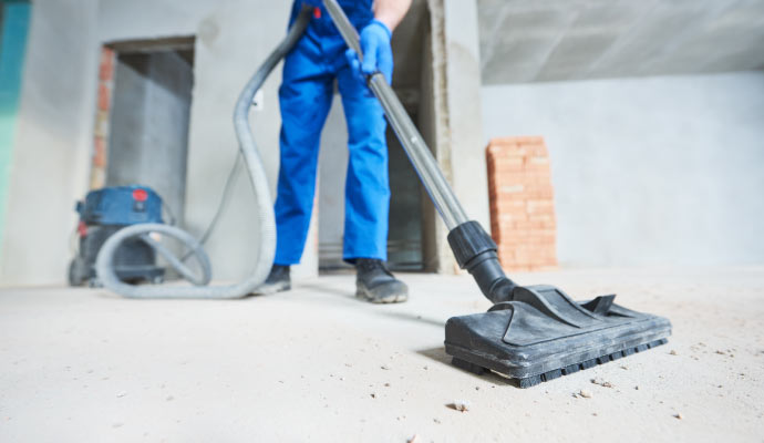 Cleaning construction dust and sand using vacuum