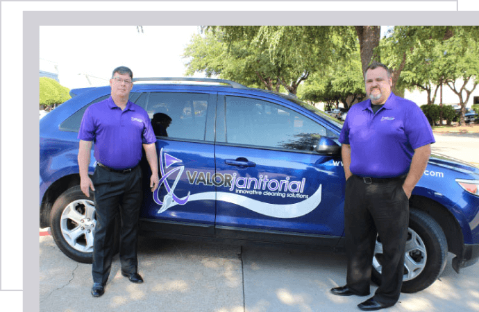 Valor Janitorial professionals in front of their service van