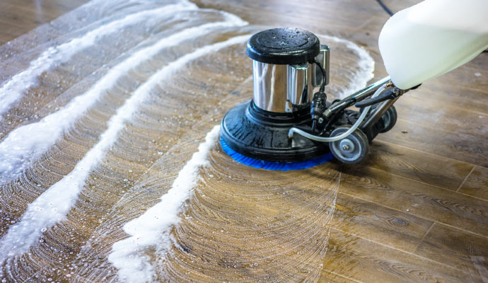 Professional cleaning floor using equipment